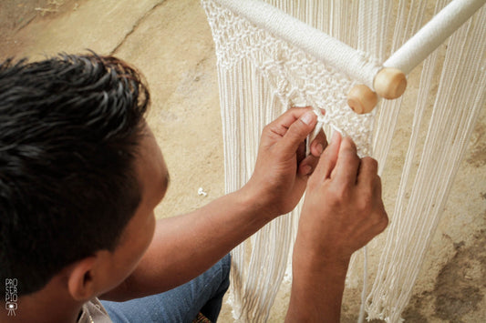 artisan waving a hammock
