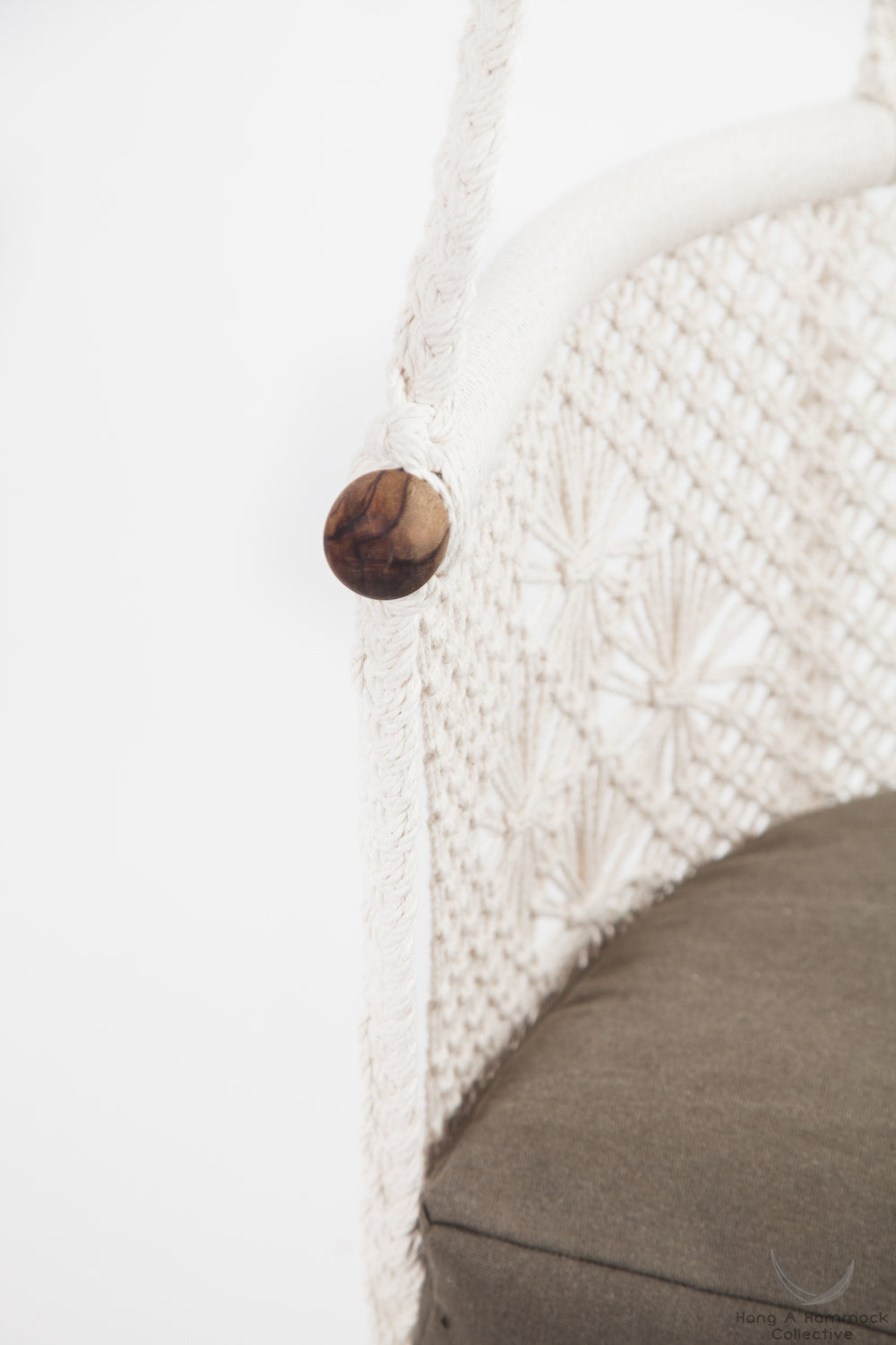 Close-up of solid teak wood finish with natural linseed oil on hanging chair