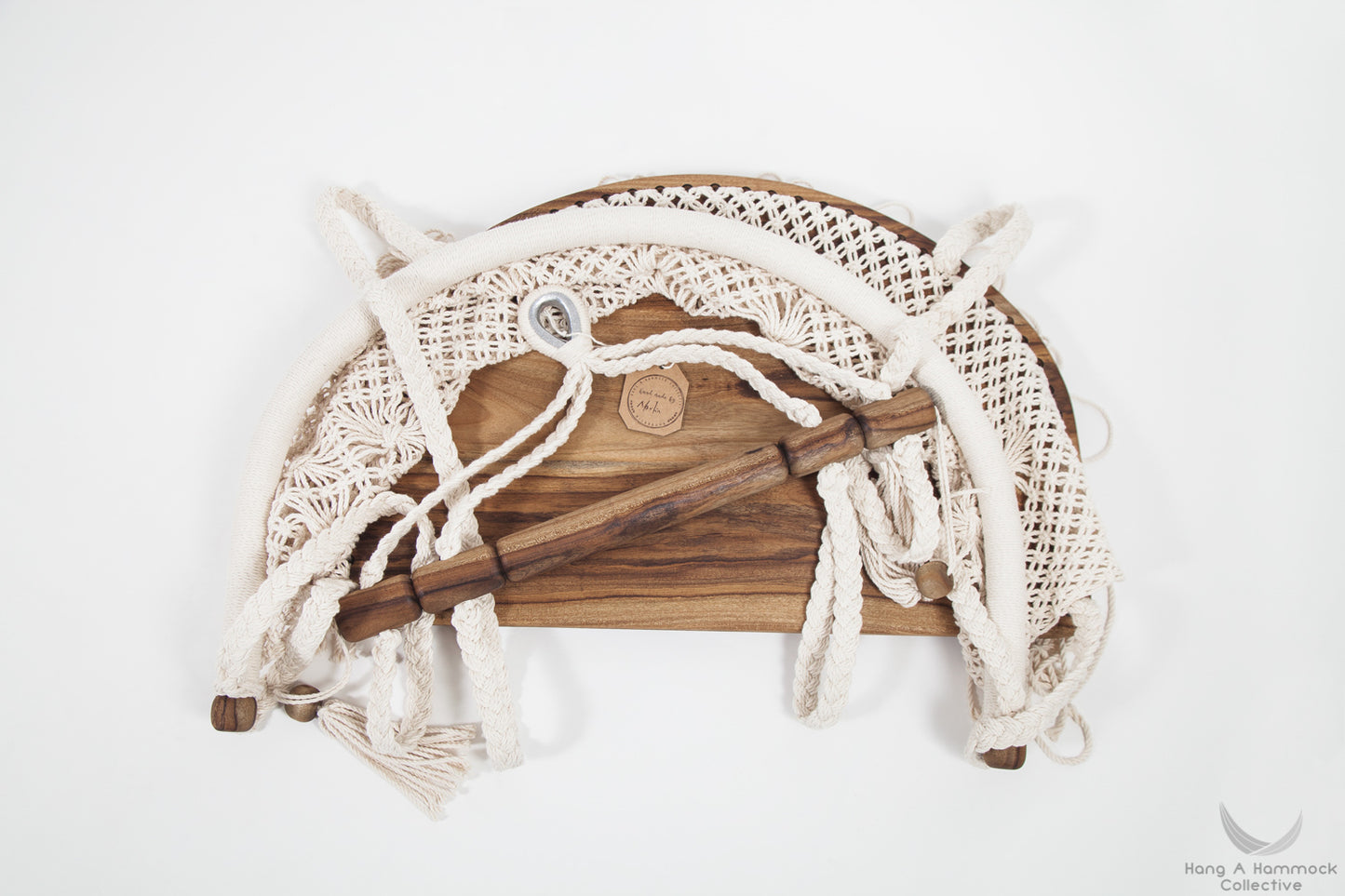 hanging chair. timber seat detail. studio photo from the top view