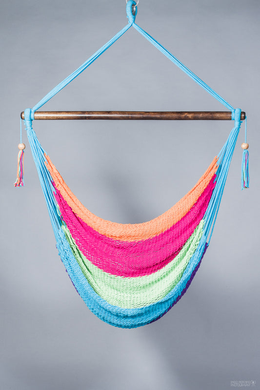 hammock chair of different colors. Grey background
