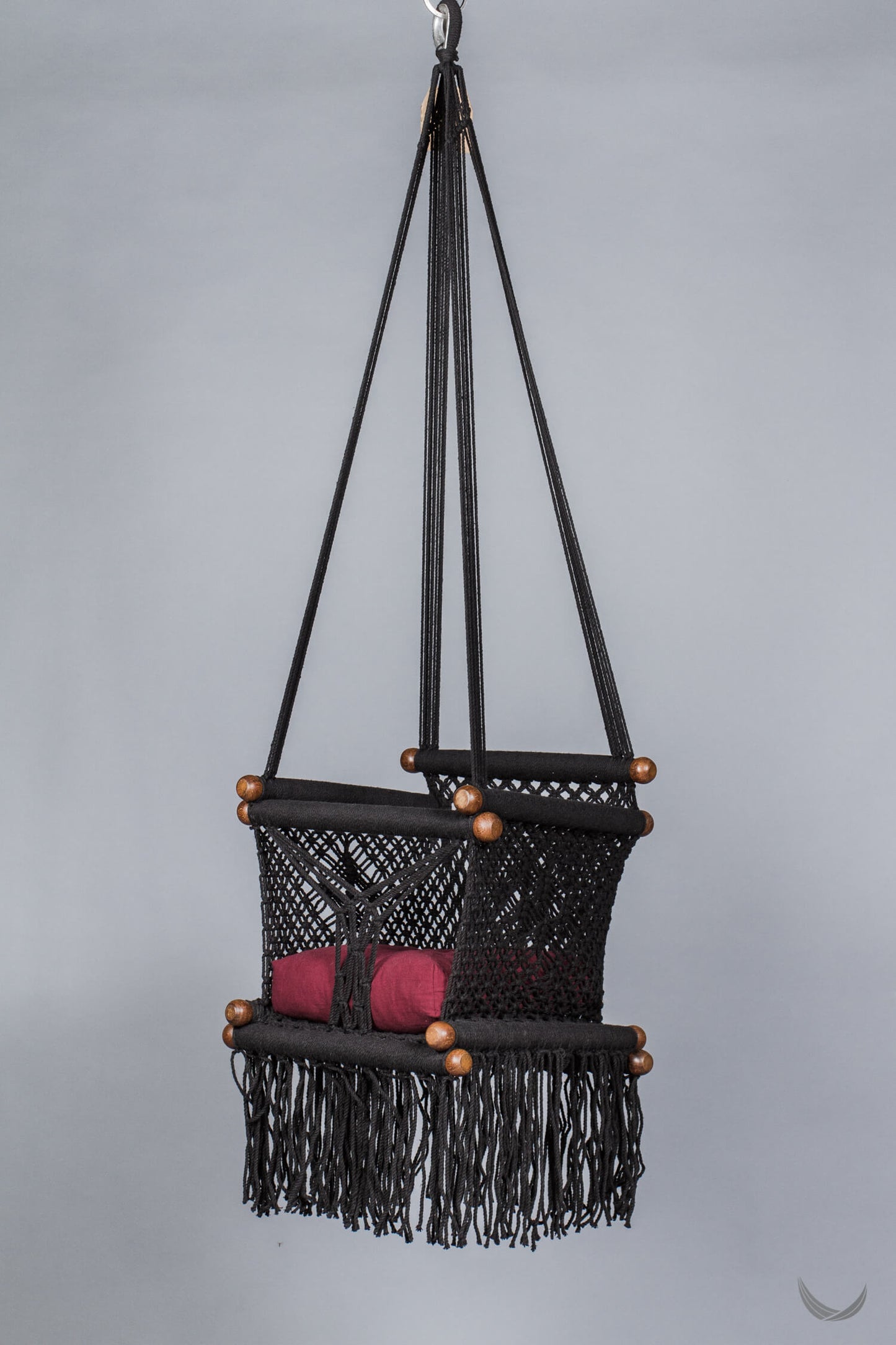 baby swing chair with red cushion