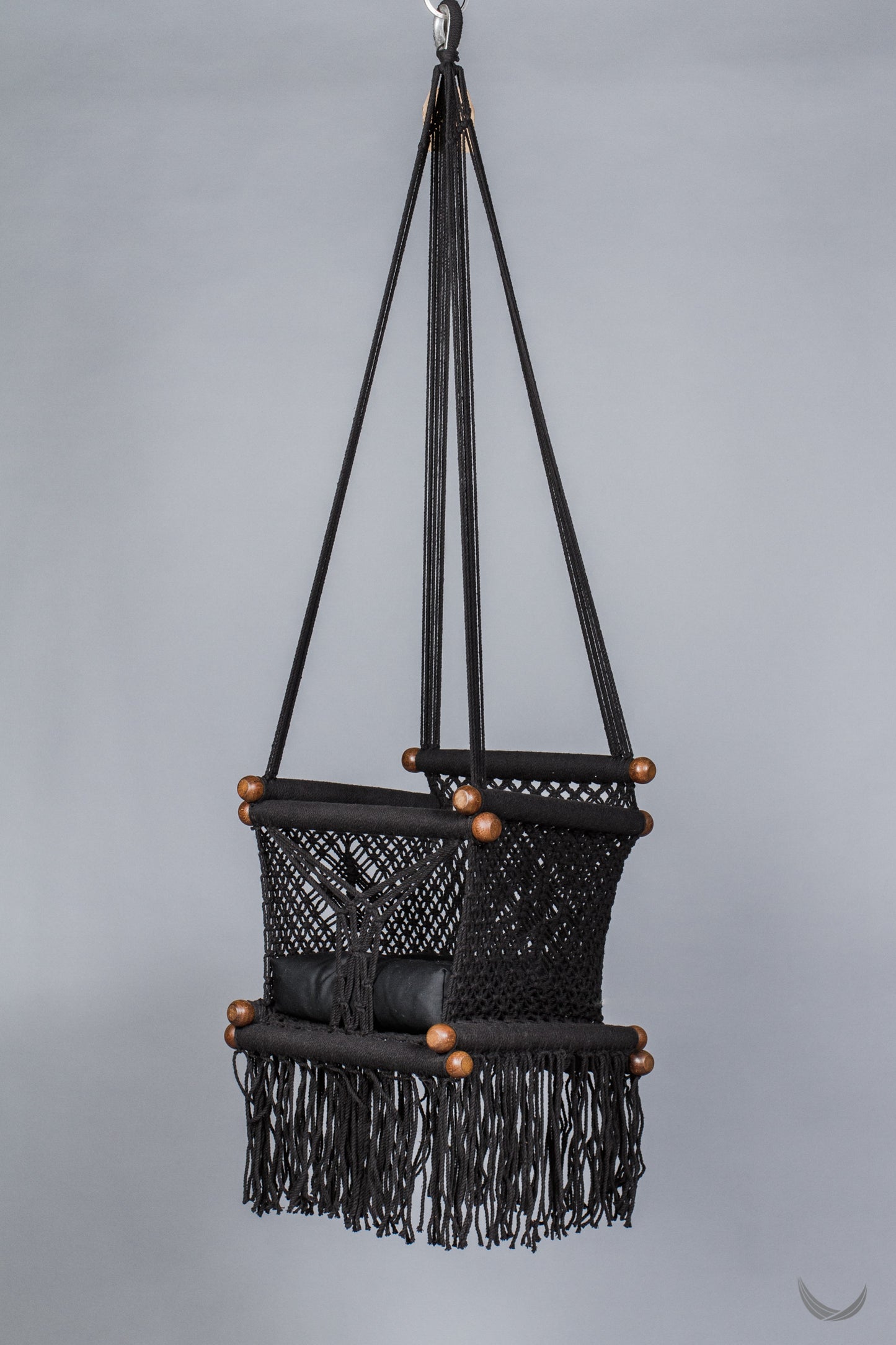 black color baby swing chair with a black color pad