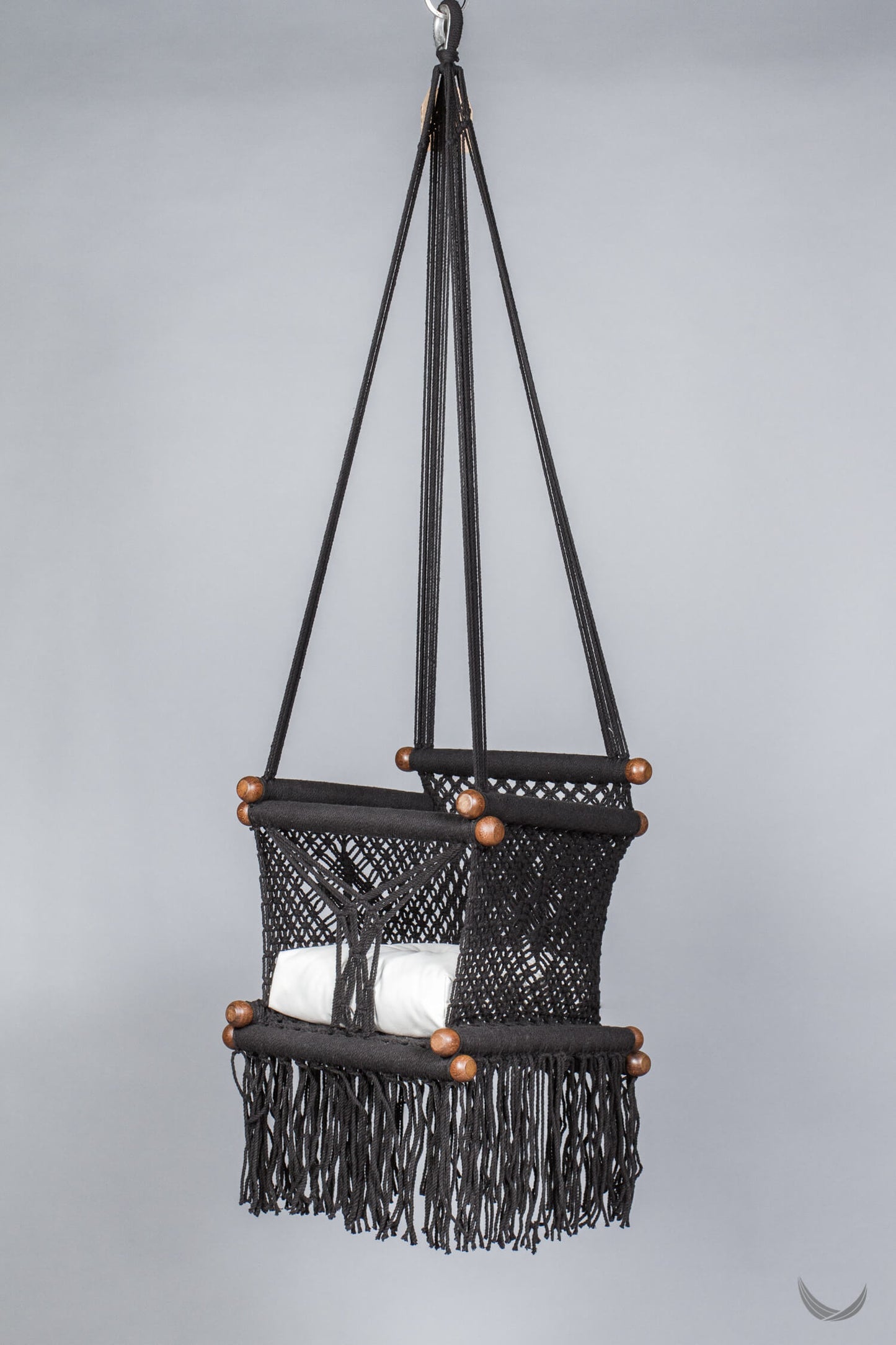baby swing chair with off-white cushion