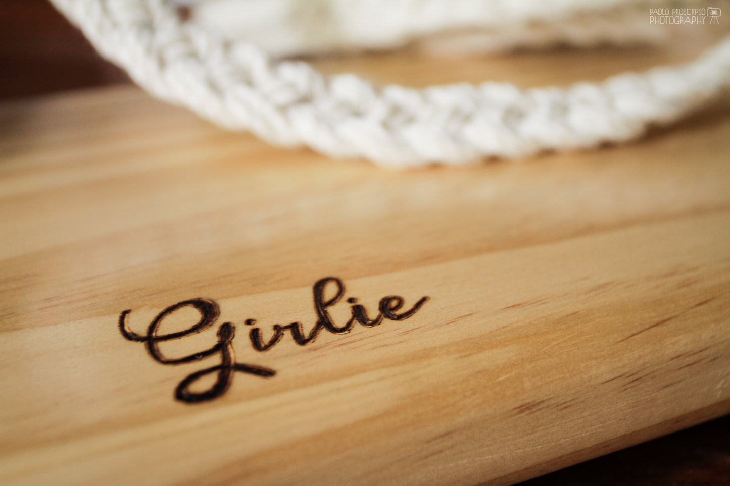 pyrography work on a swing wooden seat