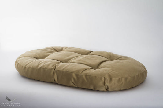 khaki color cotton mattress filled with cotton fibers - studio picture