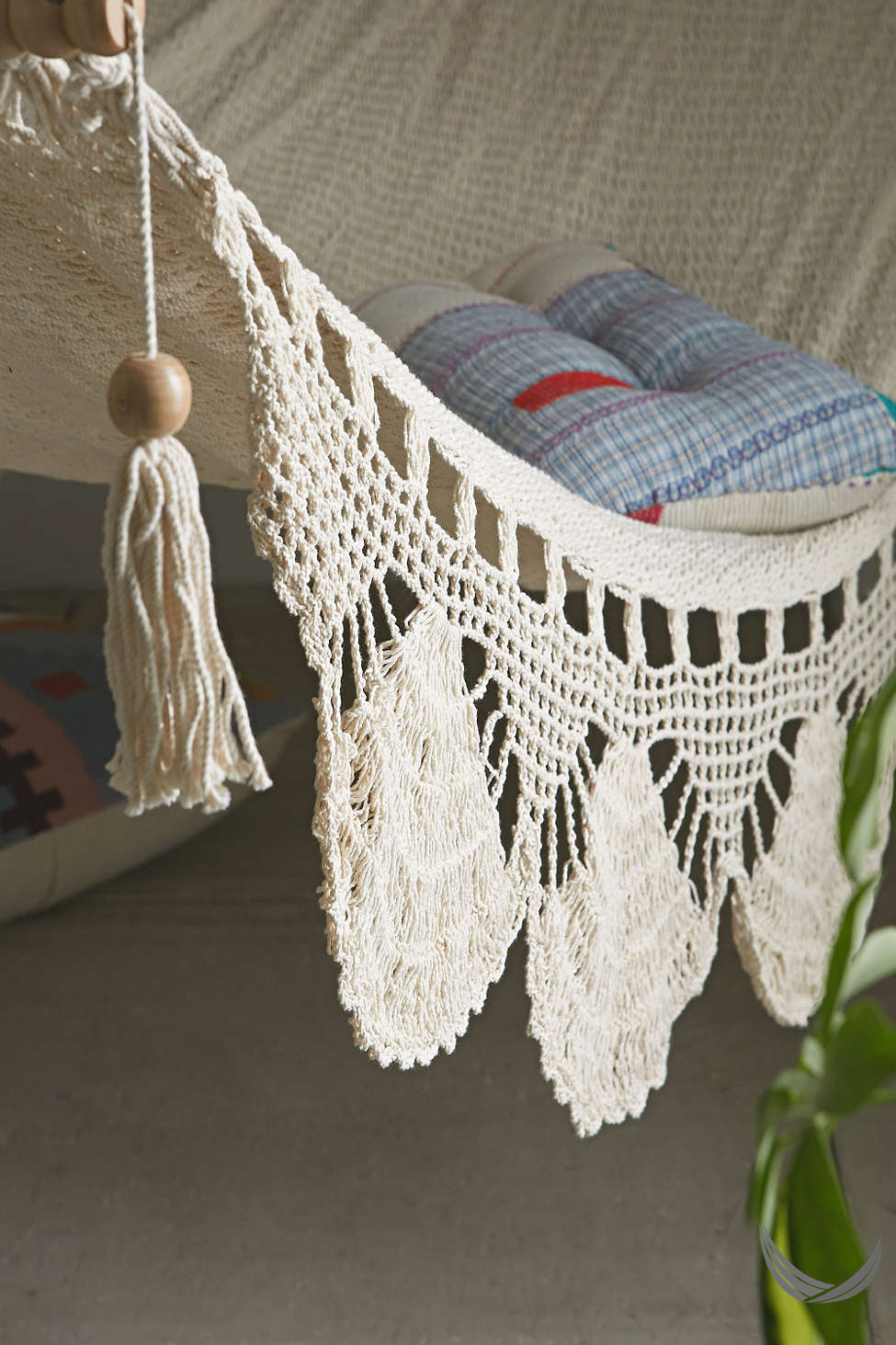 Close-up of crochet fringe on natural cotton rope hammock handmade in Nicaragua
