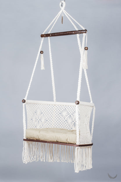 ivory color hanging chair with a khaki color cushion