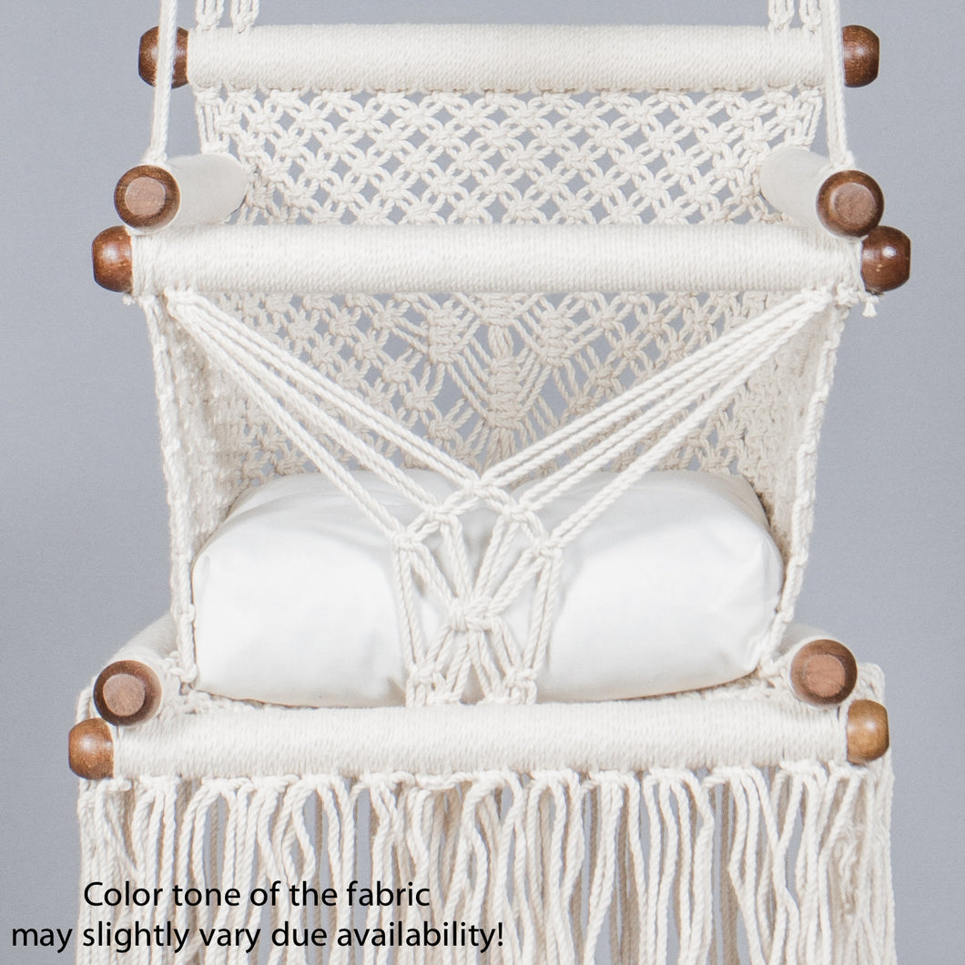 detail of a white cushion on a baby swing chair