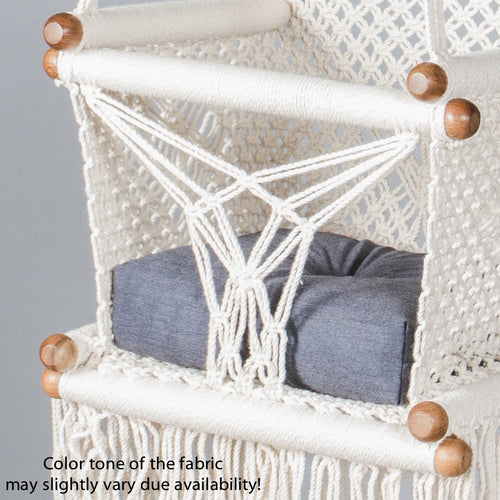 detail of a blue cushion on a baby swing chair