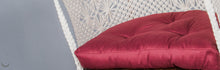 red color half-moon cushion 