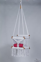 baby swing chair in grey - red cushion - studio picture