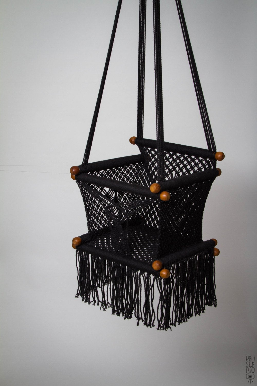 close-up of a black color baby swing chair