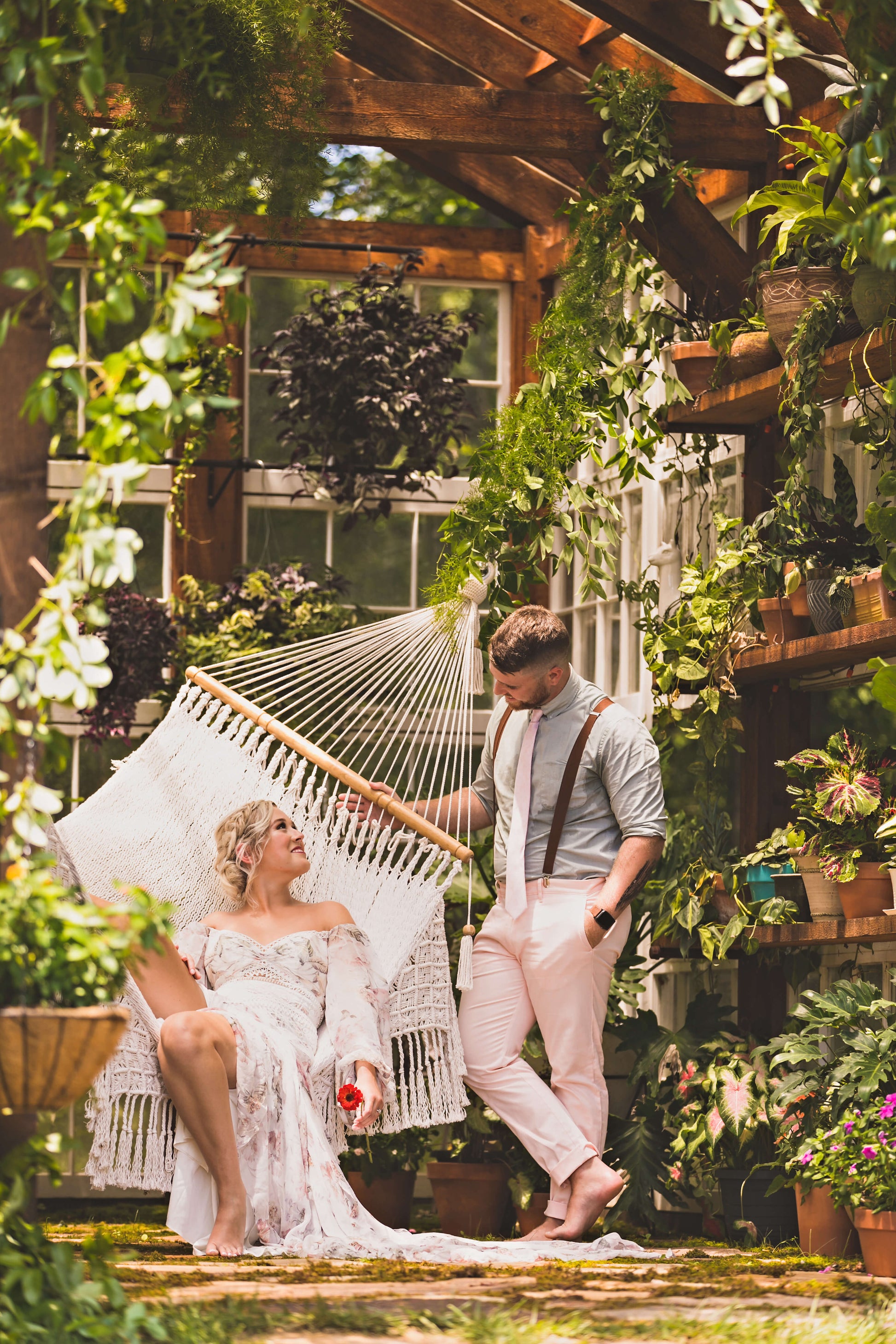 bride and groom on a hammock